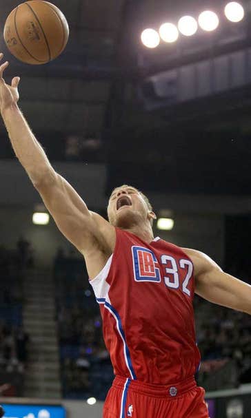 Griffin and Paul lead Clippers to 111-104 win in season opener
